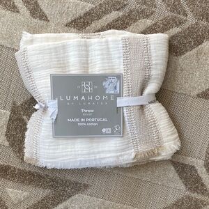 Cream and Tan Cotton Throw